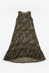 Leopard print dress on a hanger against a white wall