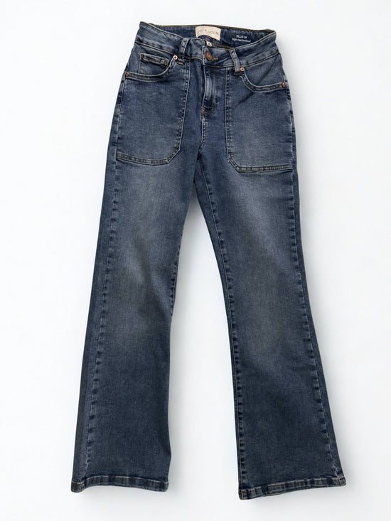 Pair of blue jeans on a white background