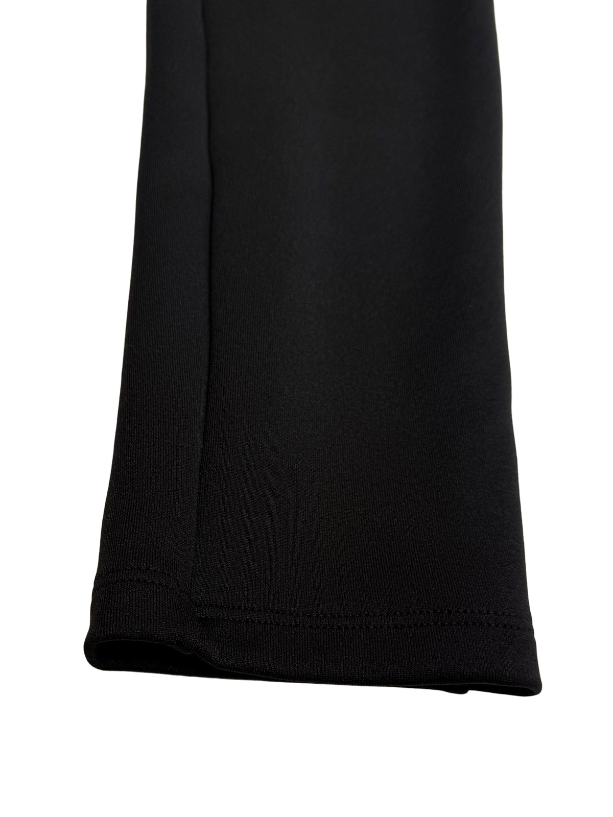 Black pants on a light gray background