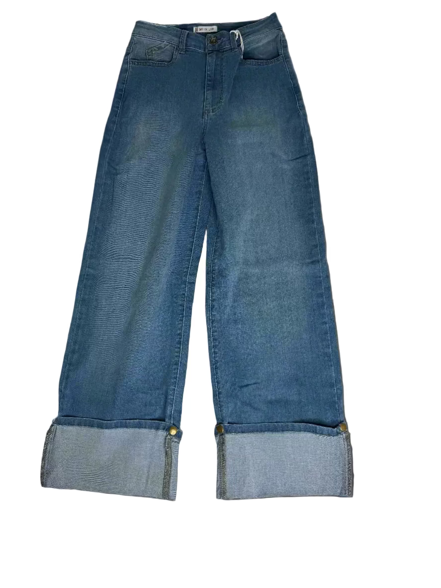 Blue jeans with rolled-up cuffs on a white background