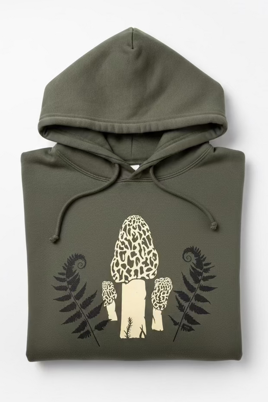 An olive green hoodie with a printed graphic of three beige morel mushrooms and black ferns on the front, laid flat.