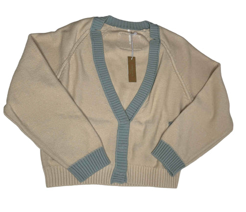 Beige sweater with blue trim on a white background