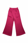 Pink pants on a white surface