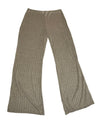 Pair of beige ribbed pants on a white surface